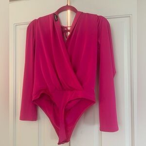Backless, pink bodysuit